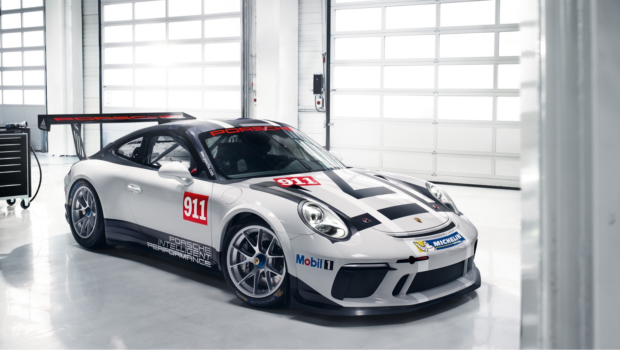 Porsche roll out the 911 GT3 racecar in Paris Porsche roll out the 911 GT3 racecar in Paris