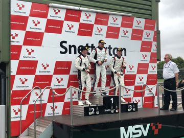 Ollie coles on podium
