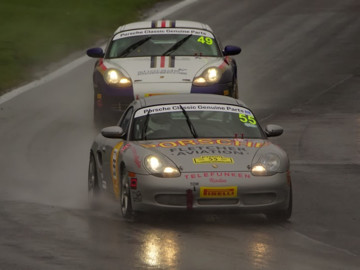 Scot in heavy rain during restoracing season at oulton park